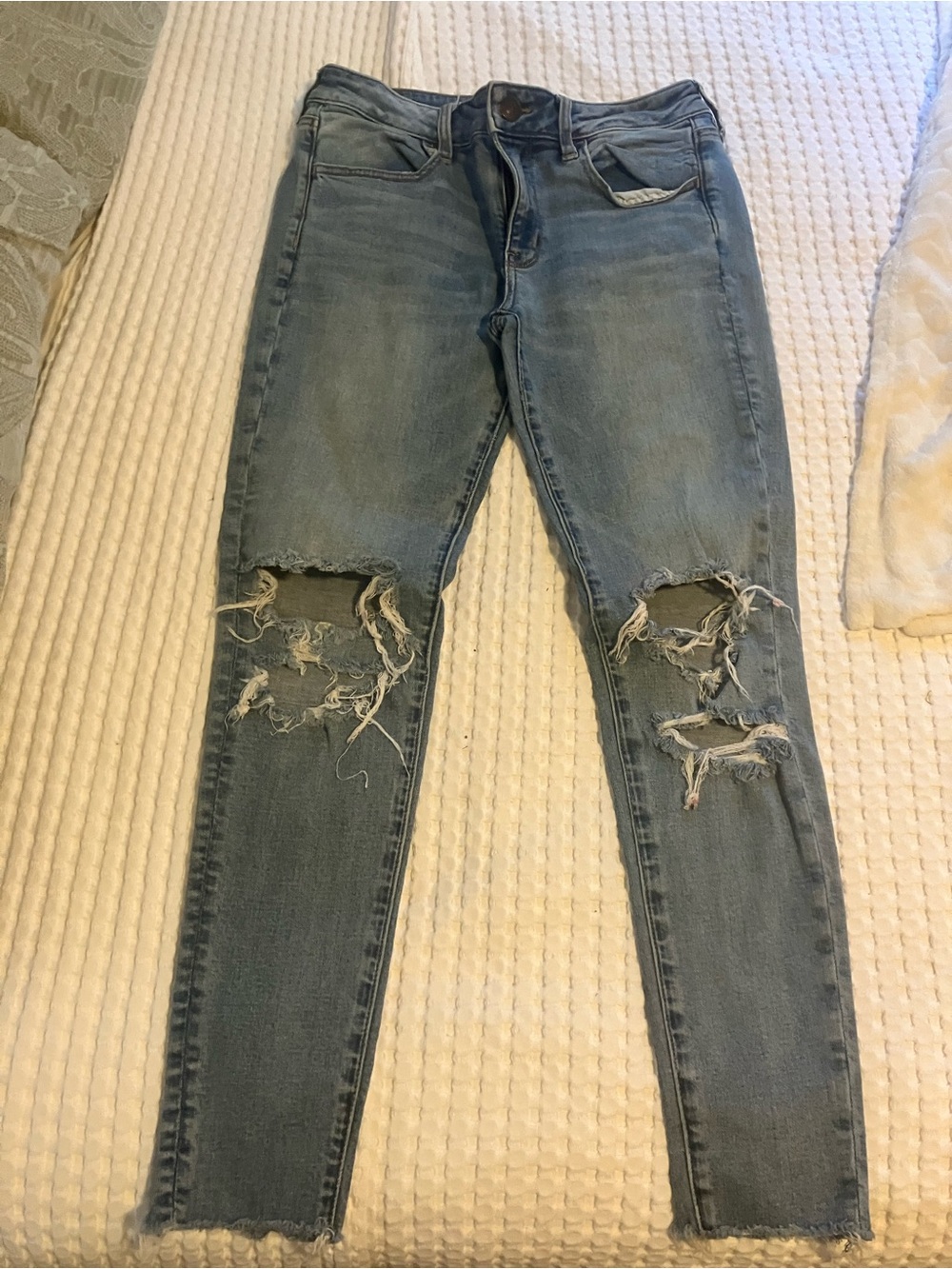 American Eagle Outfitters Washed Light Blue Ripped Skinny Jeans